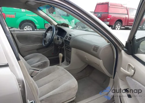 1999 Toyota Corolla Ce из США, поврежденный, VIN 2T1BR12E8XC103745
